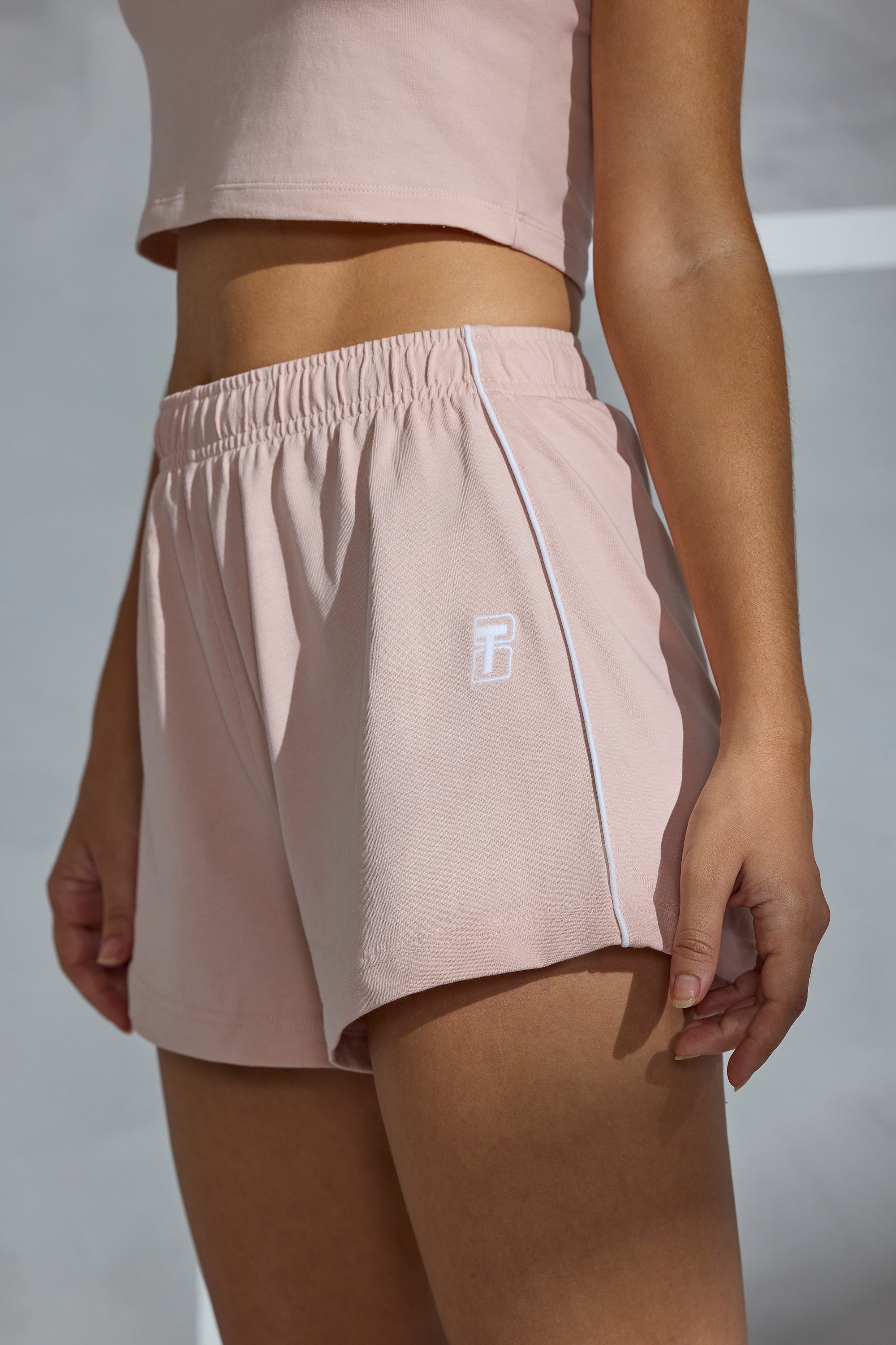 Piped Detail Mini Sweat Shorts in Peach