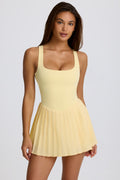 Soft Active Open-Back Pleated Tennis Dress in Lemon