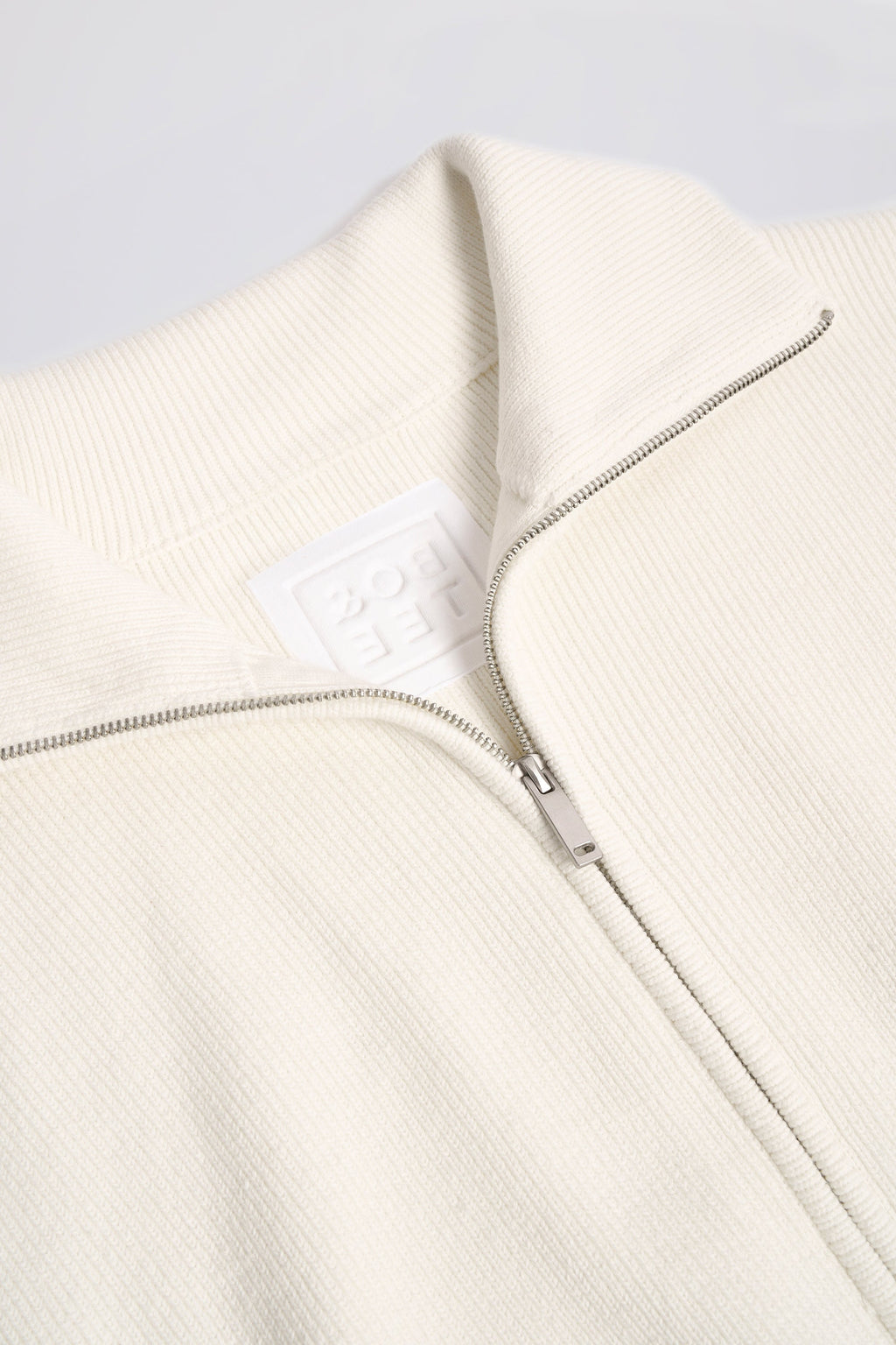 Ribbed Knit Zip-Up Cropped Sweatshirt in Ivory