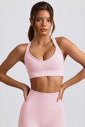 Super Sculpt Seamless Crossback Sports Bra in Powder Pink