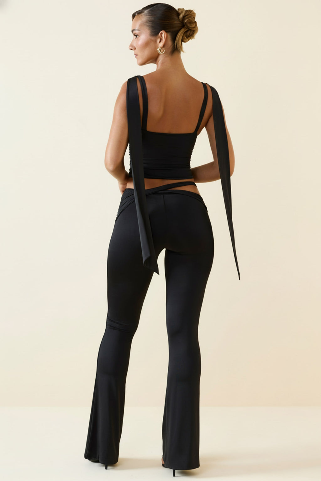 Cut-Out Mid-Rise Flared Trousers in Black