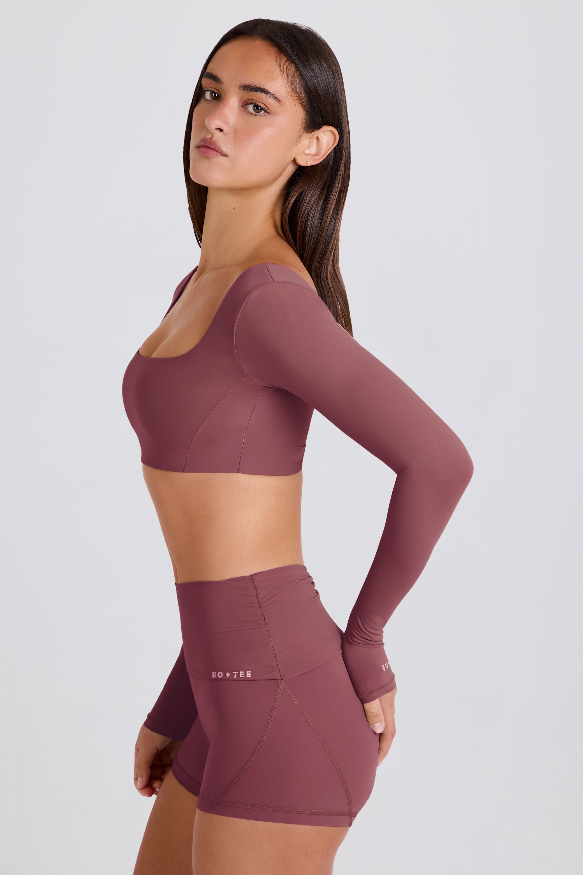 Four-Way Stretch Multiway Long-Sleeve Crop Top in Acai