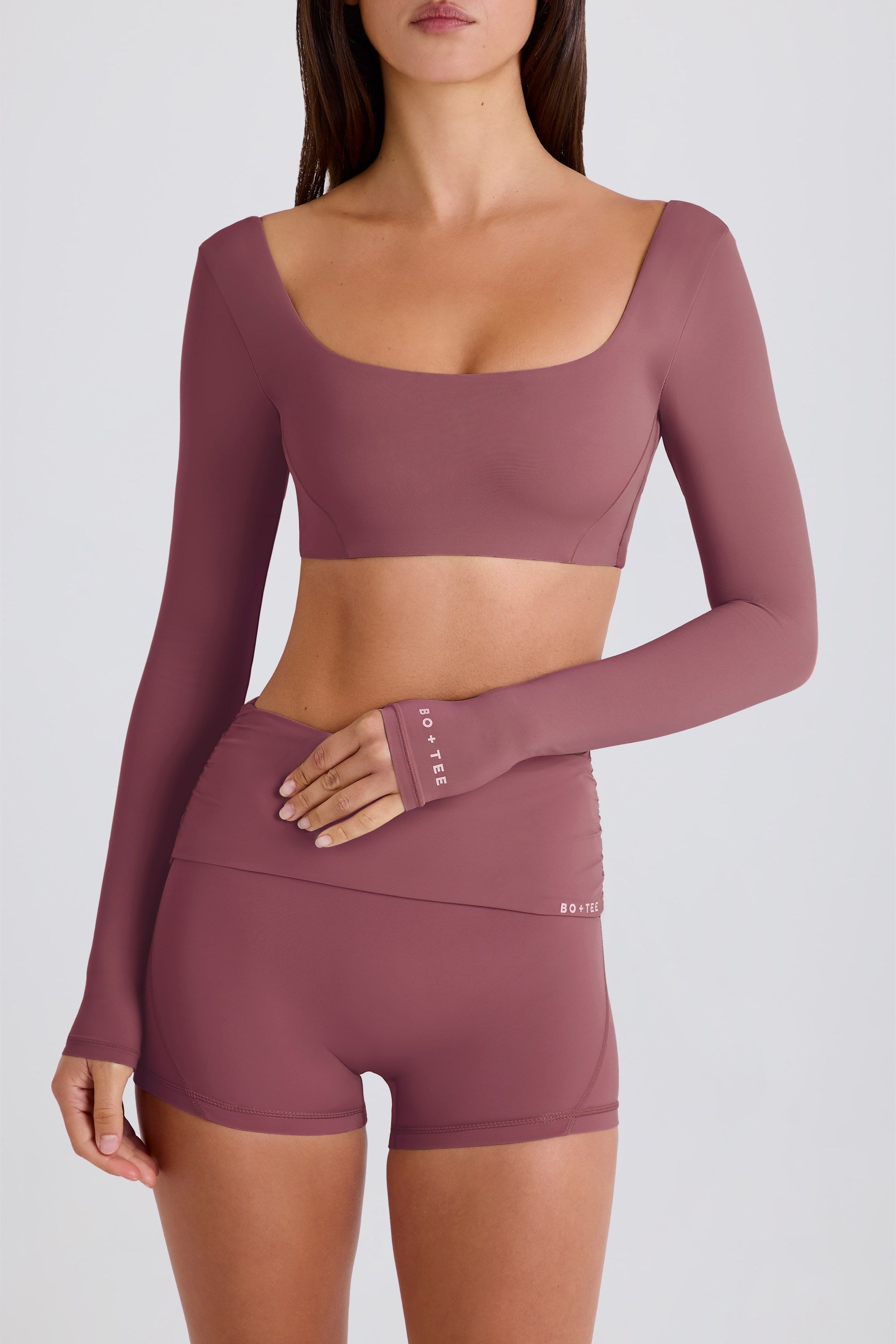 Four-Way Stretch Multiway Long-Sleeve Crop Top in Acai